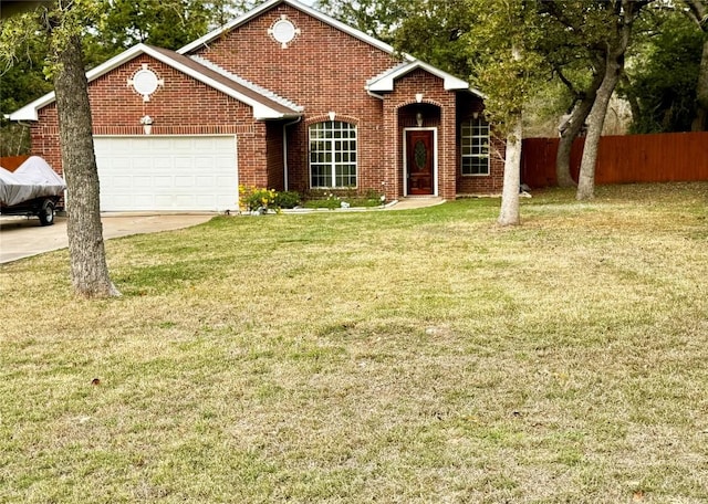 single story home featuring a garage and a front yard