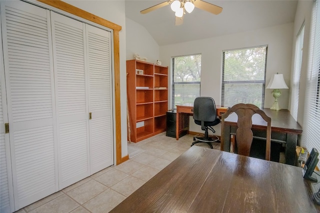 tiled office with ceiling fan and lofted ceiling