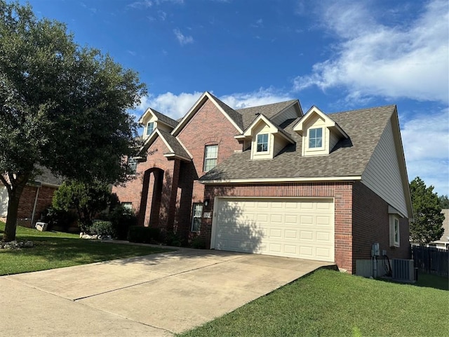 view of front facade featuring a garage and a front lawn