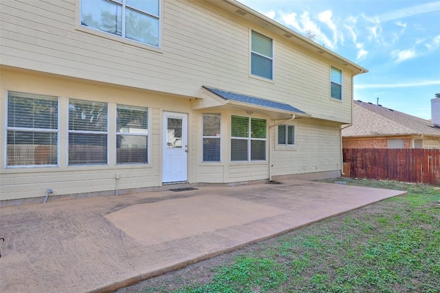 back of house featuring a patio area