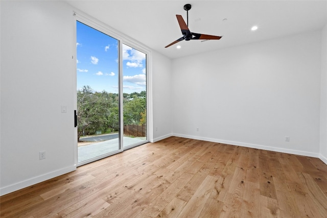 2206 Trail Of The Madrones, Austin, TX 78746 - spare room featuring ceiling fan and light wood-type flooring