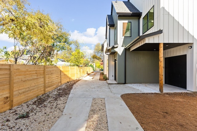 view of property exterior featuring a garage