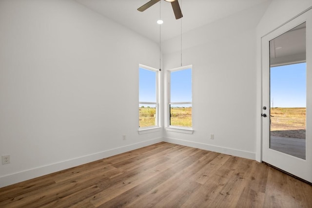 spare room with ceiling fan and light hardwood / wood-style flooring