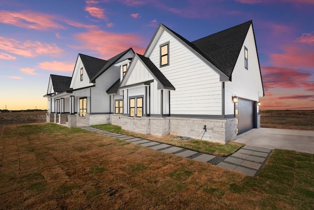 exterior space featuring a yard and a garage