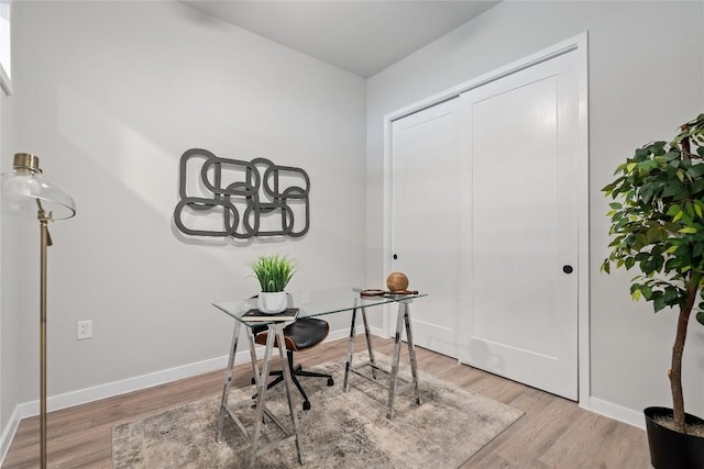 home office with light wood-type flooring