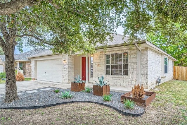 ranch-style home with a garage