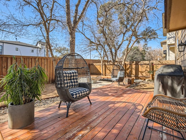 wooden terrace with area for grilling