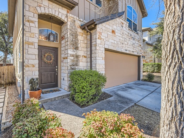 property entrance with a garage