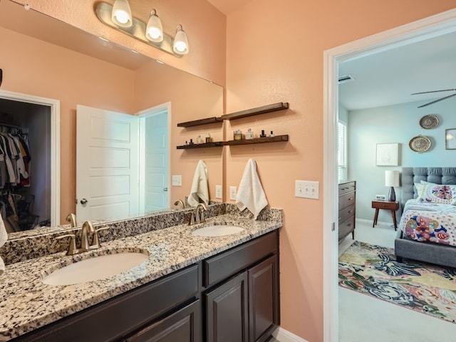 bathroom with vanity and ceiling fan