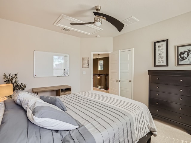 bedroom featuring ceiling fan and light carpet