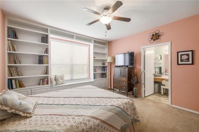 carpeted bedroom featuring ceiling fan and connected bathroom