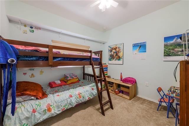 bedroom with light colored carpet and ceiling fan