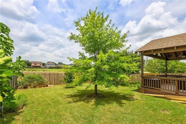 view of yard with a deck