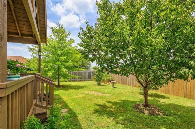 view of yard with a wooden deck