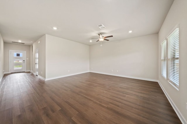 236 Lazy Lizzy Rd, Jarrell, TX 76537 - empty room featuring a ceiling fan, dark wood finished floors, recessed lighting, and baseboards