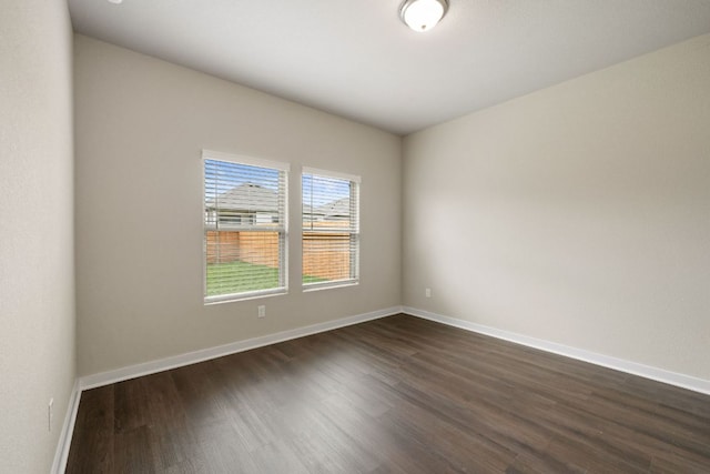 236 Lazy Lizzy Rd, Jarrell, TX 76537 - unfurnished room with dark wood-style flooring and baseboards