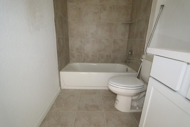 full bathroom with tile patterned floors, vanity, toilet, and tiled shower / bath