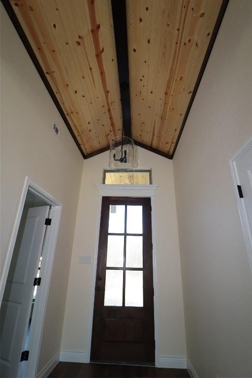 entryway featuring vaulted ceiling with beams and wood ceiling