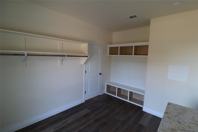 mudroom with dark hardwood / wood-style floors