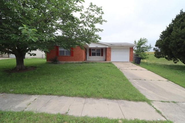 single story home featuring a front yard and a garage