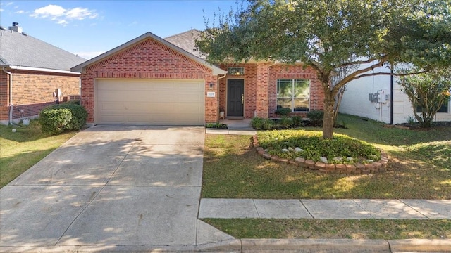 view of front of property featuring a front lawn and a garage