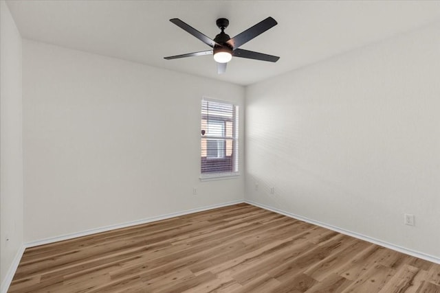 unfurnished room with ceiling fan and light hardwood / wood-style flooring