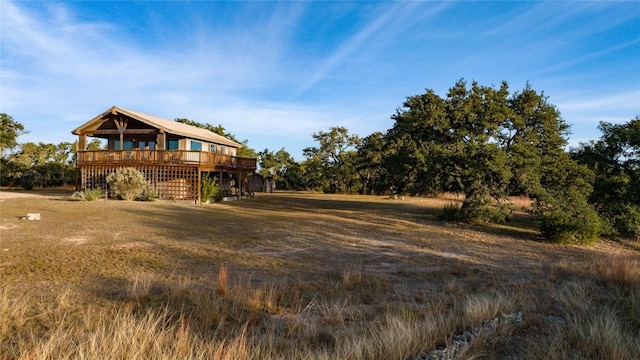 exterior space featuring a wooden deck