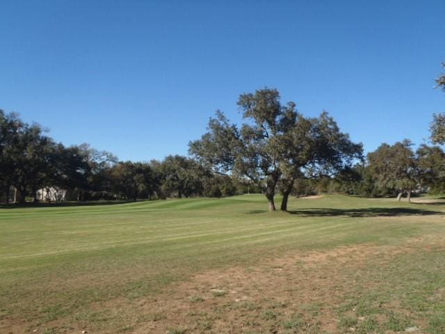 surrounding community featuring a lawn