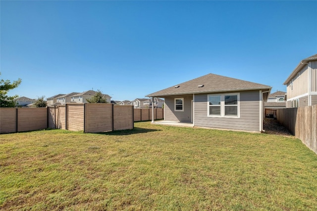 12101 Corsicana Trl, Manor, TX 78653 - back of house with a fenced backyard