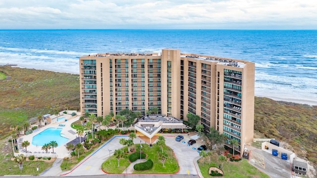 aerial view featuring a view of the beach and a water view