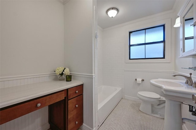 bathroom with toilet, tile patterned floors, shower / washtub combination, and ornamental molding