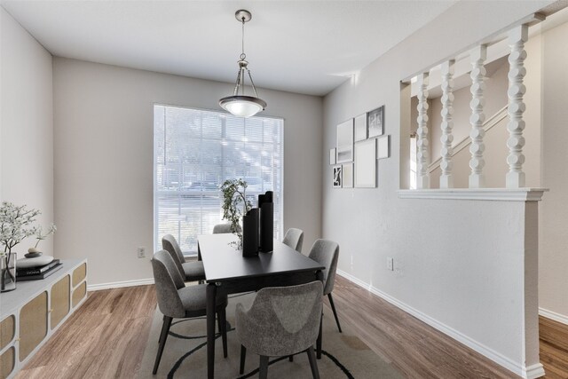 dining area featuring hardwood / wood-style flooring