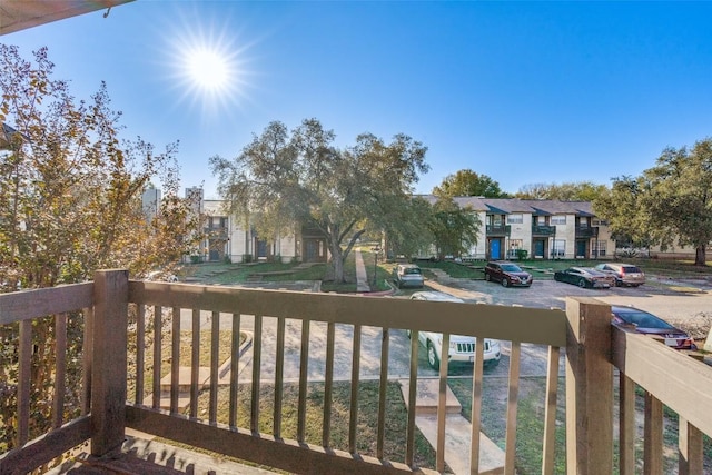 1815 River Crossing Cir Unit D, Austin, TX 78741 - wooden terrace featuring a residential view