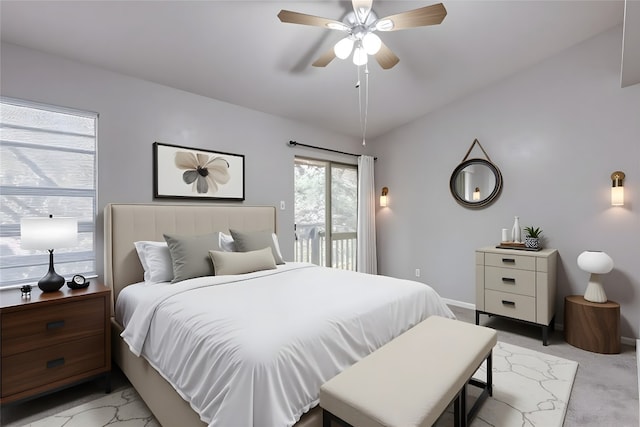 1815 River Crossing Cir Unit D, Austin, TX 78741 - bedroom featuring light carpet, baseboards, ceiling fan, and access to outside