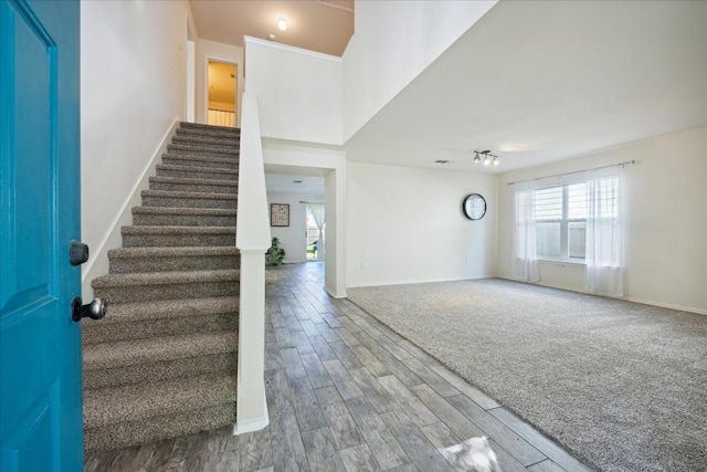 entryway with hardwood / wood-style flooring