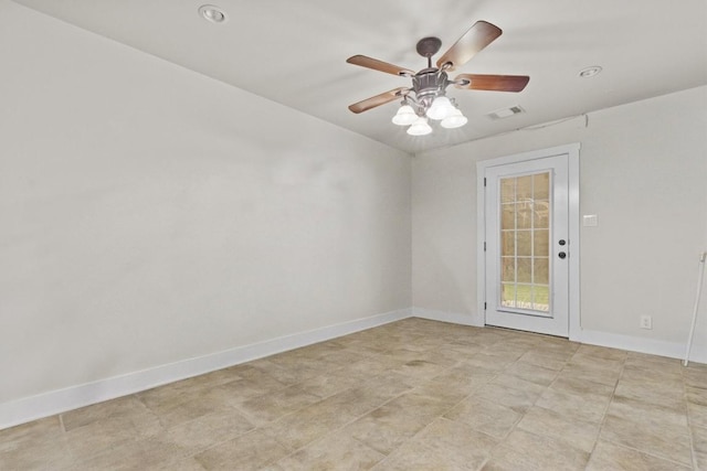 unfurnished room with ceiling fan