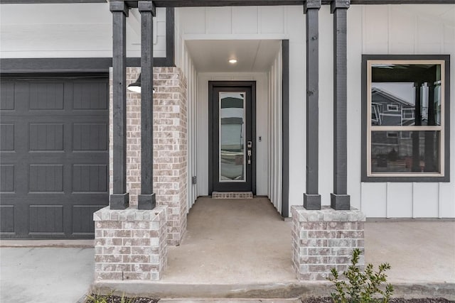 entrance to property featuring a garage