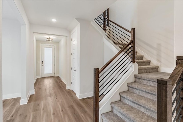 entryway with light hardwood / wood-style flooring