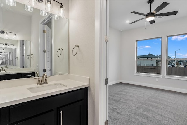 bathroom featuring vanity and ceiling fan