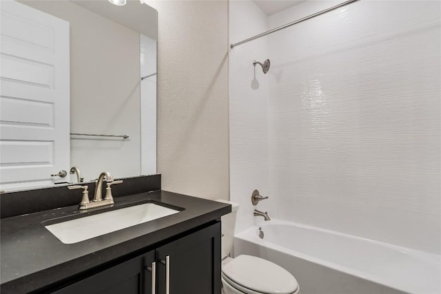 full bathroom with vanity, toilet, and shower / washtub combination