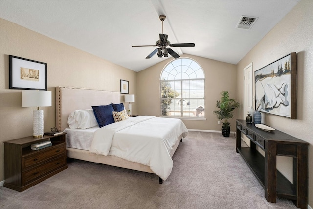 bedroom with carpet, ceiling fan, and vaulted ceiling