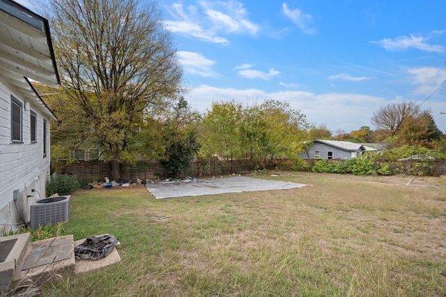 1718 Adina St, Austin, TX 78721 - fenced backyard featuring a patio area and an outdoor fire pit