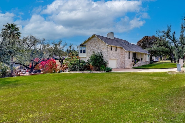 view of property exterior with a lawn and a garage