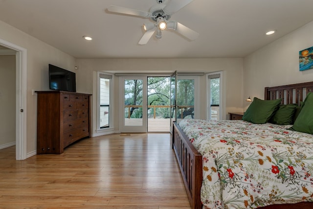 bedroom featuring access to outside, ceiling fan, and light wood-type flooring