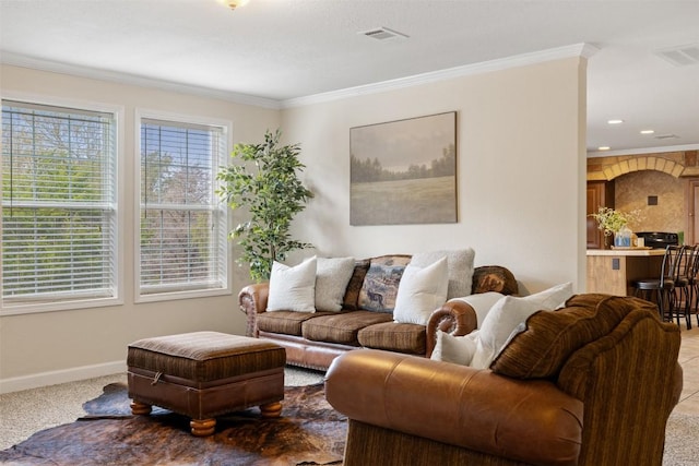 carpeted living area featuring recessed lighting, baseboards, visible vents, and ornamental molding