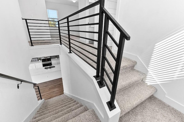 stairs with wood-type flooring