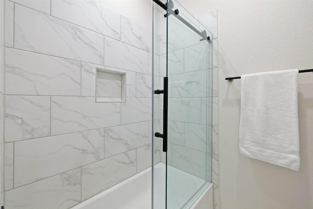 bathroom featuring enclosed tub / shower combo