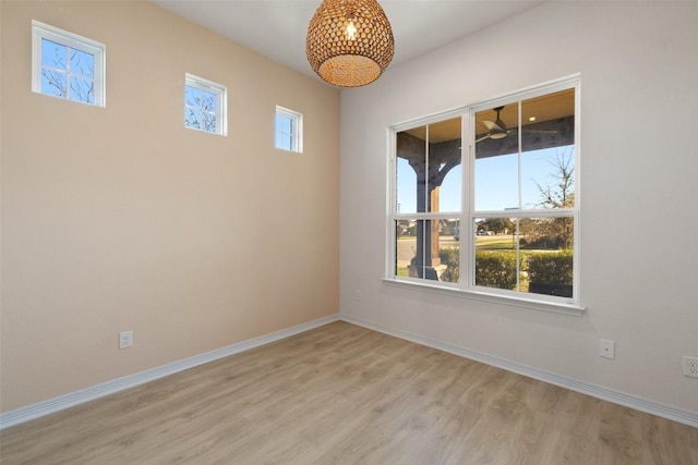 spare room featuring light hardwood / wood-style floors