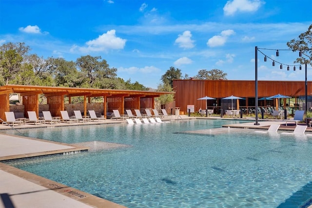 view of pool featuring a patio area