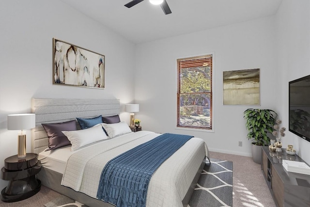 bedroom with ceiling fan and carpet floors